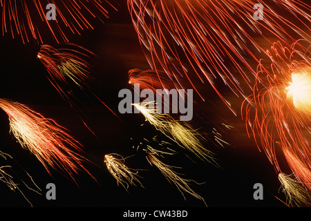 Exploding fireworks in sky Stock Photo