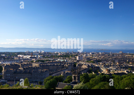 View from Calton Hill in summer sunshine, looking to Firth of Forth and coastline of Fife, Edinburgh, Scotland, UK, GB, British Stock Photo