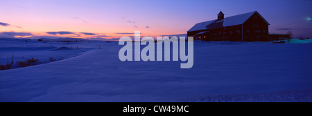 Shed in snow in dwindling twilight, Vermont Stock Photo