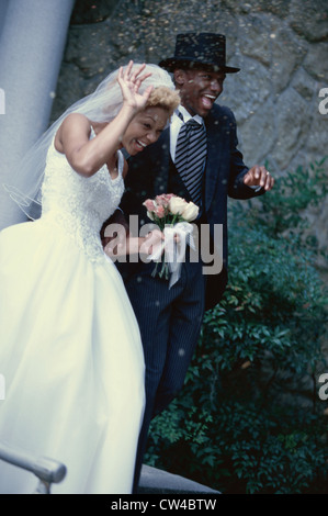 Newlywed couple walking together Stock Photo