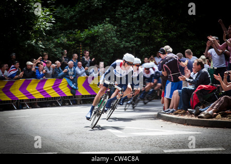 Team GB round the hairpin on the Box Hill loop, led out by David Millar during the Olympic road race at London 2012. Stock Photo