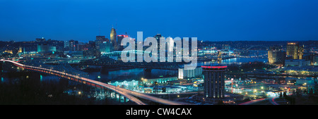 Panoramic night shot of Cincinnati skyline and lights, Ohio and Ohio River as seen from Covington, KY Stock Photo