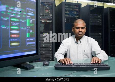 Technician working on a network server Stock Photo