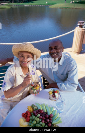 High angle view of a senior couple sitting together at a dining table Stock Photo