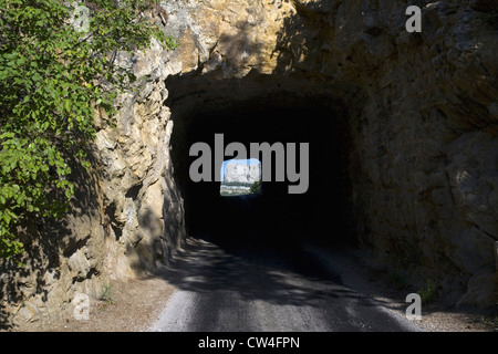 Tunnel on Iron Mountain Road in Black Hills framing view of Mount Rushmore National Memorial, South Dakota Stock Photo