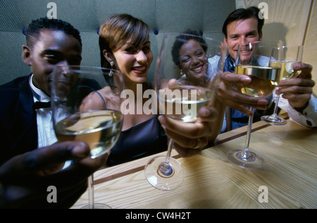 High angle view of two young couples toasting with wineglasses Stock Photo