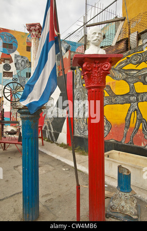 A Cuban flag shown in the Callejon de Hamel art and music district of Havana Cuba Stock Photo