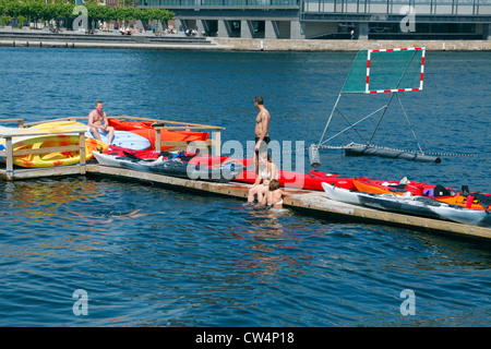 Watersport / aquatics facilities and equipment at the Islands Brygge wharf in the inner harbour of Copenhagen, Denmark on a sunny summer day. Stock Photo