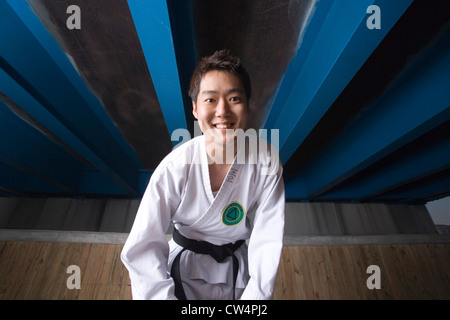 Young man smiling in sports uniform Stock Photo