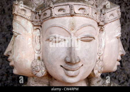 Hindu God Brahma With four Heads artistic and religious Sculpture at Tamil Nadu in India Stock Photo