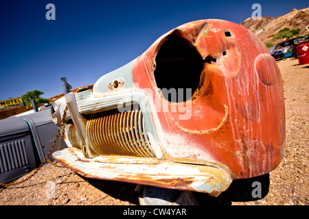 BEATTY, NV - MAY 5: Junkyard with Vintage car in Beatty Nevada on May 5, 2012. Stock Photo