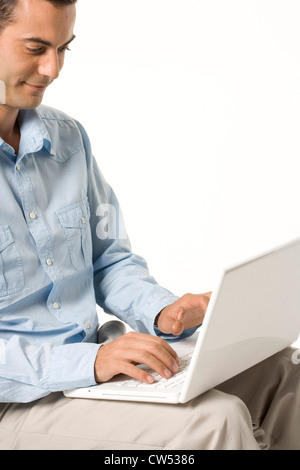 Businessman using a laptop Stock Photo