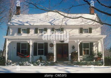 Snow covered two-story home at Christmas, Woodstock, NY Stock Photo