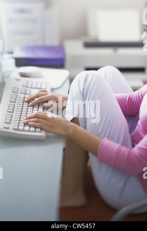 Young woman using a computer Stock Photo
