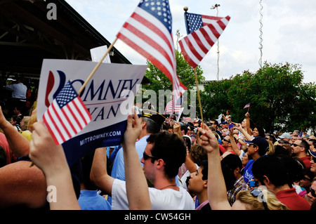 A large crowd of enthusiastic Mitt Romney supporters waving signs and US flags at a rally in Manassas Virginia Stock Photo