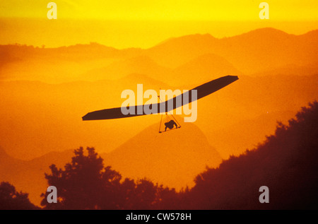 Solar Sailing Hang Gliding in sunset silhouette, Malibu, CA Stock Photo