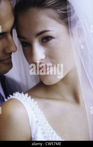 Newlywed couple standing together Stock Photo
