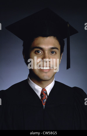 Portrait of a young man wearing a graduation outfit Stock Photo