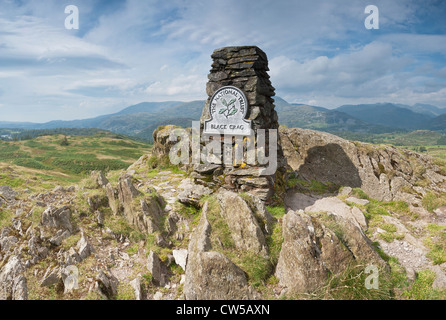 Trig point column on summit of Black Crag (Black Fell) in the Southern Lake District Stock Photo