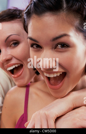 Portrait of two young women smiling Stock Photo