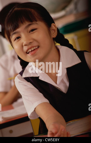 Portrait of smiling black girl student showing okay gesture Stock Photo ...