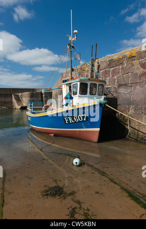 A Fraserburgh registered fishing boat in Pennan Harbour Stock Photo