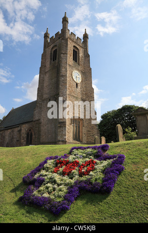 Floral display marking 700 years outside the Parish church of St Edmund, Sedgefield, north east England UK Stock Photo