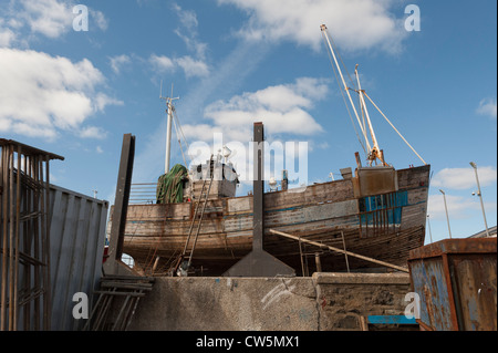 Fishing Vessel in shipyard at Macduff on the north Aberdeenshire coast. Stock Photo