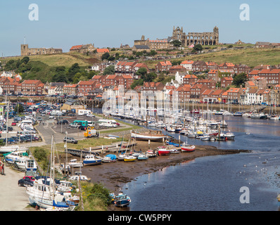 View over Whitby Yorkshire UK from New Bridge showing Inner Harbour Abbey and St. Marys Church Stock Photo