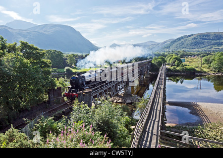 Black Five 45407 'The Lancashire Fusilier’ pulling the Jacobite Steam train over  River Lochy at Inverlochy near Fort William Stock Photo