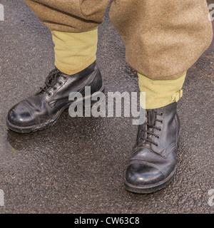 A pair of army boots worn at a 1940's event in the Uk Stock Photo