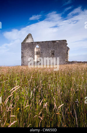 Ruin of an old church in a field on the Isle of Skye, Scotland, UK Stock Photo