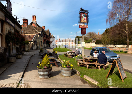 The Longs Arms Pub, is a 17th Century former Coach House set in the picturesque village of Steeple Ashton in Wiltshire, UK Stock Photo