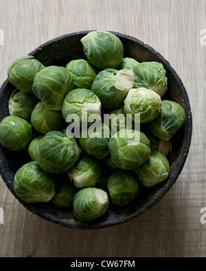 Bowl of uncooked Brussels Sprouts Stock Photo