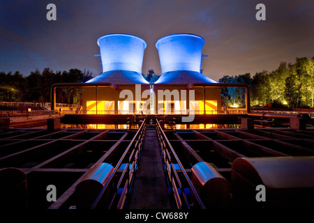 'World of Water' with cooling towers beside the Jahrhunderthalle in the the West Park Bochum, Germany, North Rhine-Westphalia, Ruhr Area, Bochum Stock Photo