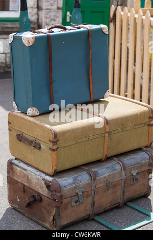 old fashioned luggage, suitcases  and porters trolleys at Corfe castle station. Swanage Railway Dorset England UK Stock Photo