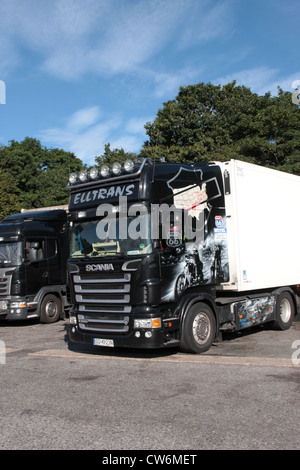 The airbrushed cab of a Scania R500 V8 operated by Elltrans of Gdansk Poland parked in motorway services on the M1 UK Stock Photo