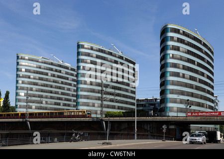 Trias City Towers in Berlin with passing train, Germany, Berlin Stock Photo