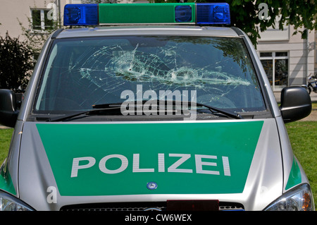 broken front shield of a police car during a demonstration agains Naonazi manifestation, Germany, Baden-Wuerttemberg, Ulm Stock Photo