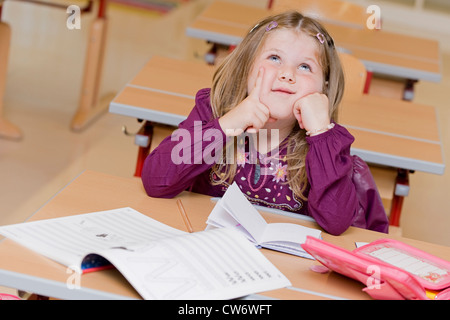 thoughtfully pupil in school Stock Photo