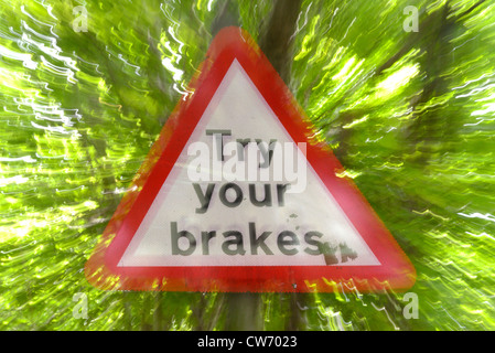 try your brakes warning sign after ford running across road Bardsey Yorkshire UK Stock Photo