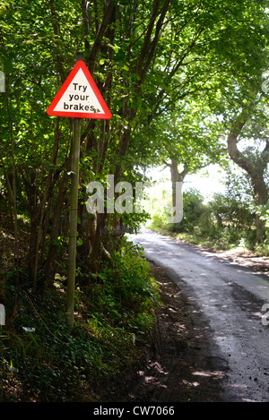 try your brakes warning sign after ford running across road Bardsey Yorkshire UK Stock Photo