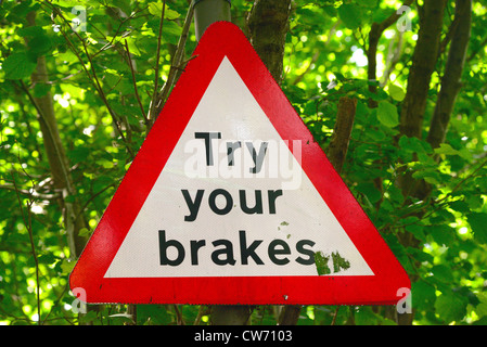 try your brakes warning sign after ford running across road Bardsey Yorkshire UK Stock Photo