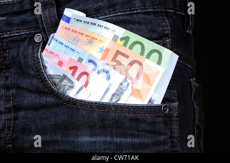 banknotes in trouser pocket, pocket money Stock Photo