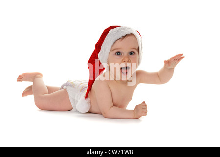 small child with Santa Claus hat baby Stock Photo