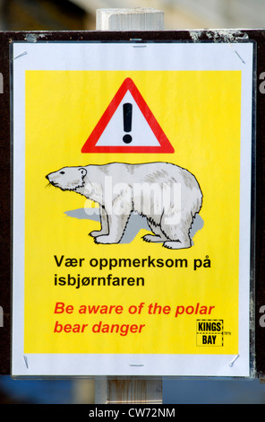 yellow polar bear warning signage outside the remote village of Ny Alesund on the Spitsbergen Archipelago, Norway, Svalbard Stock Photo