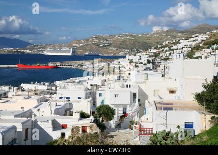 Overlooking Mykonos Town (Hora) on the island of Mykonos towards the wharfs of the docking area and passenger terminal. Stock Photo