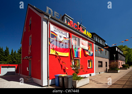 house at highway A40 decorated with German and South African flags and writing Deuschland, Germany, North Rhine-Westphalia, Ruhr Area, Essen Stock Photo