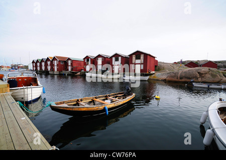 fishing huts on rocks in habour, Sweden, Bohuslaen, Smoegen Stock Photo
