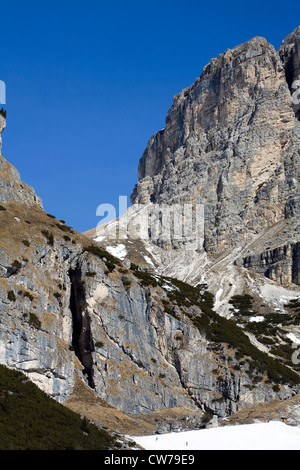 Cliff faces above The Edelweisstal above Colfosco winter  between Selva and Corvara Dolomites Italy Stock Photo